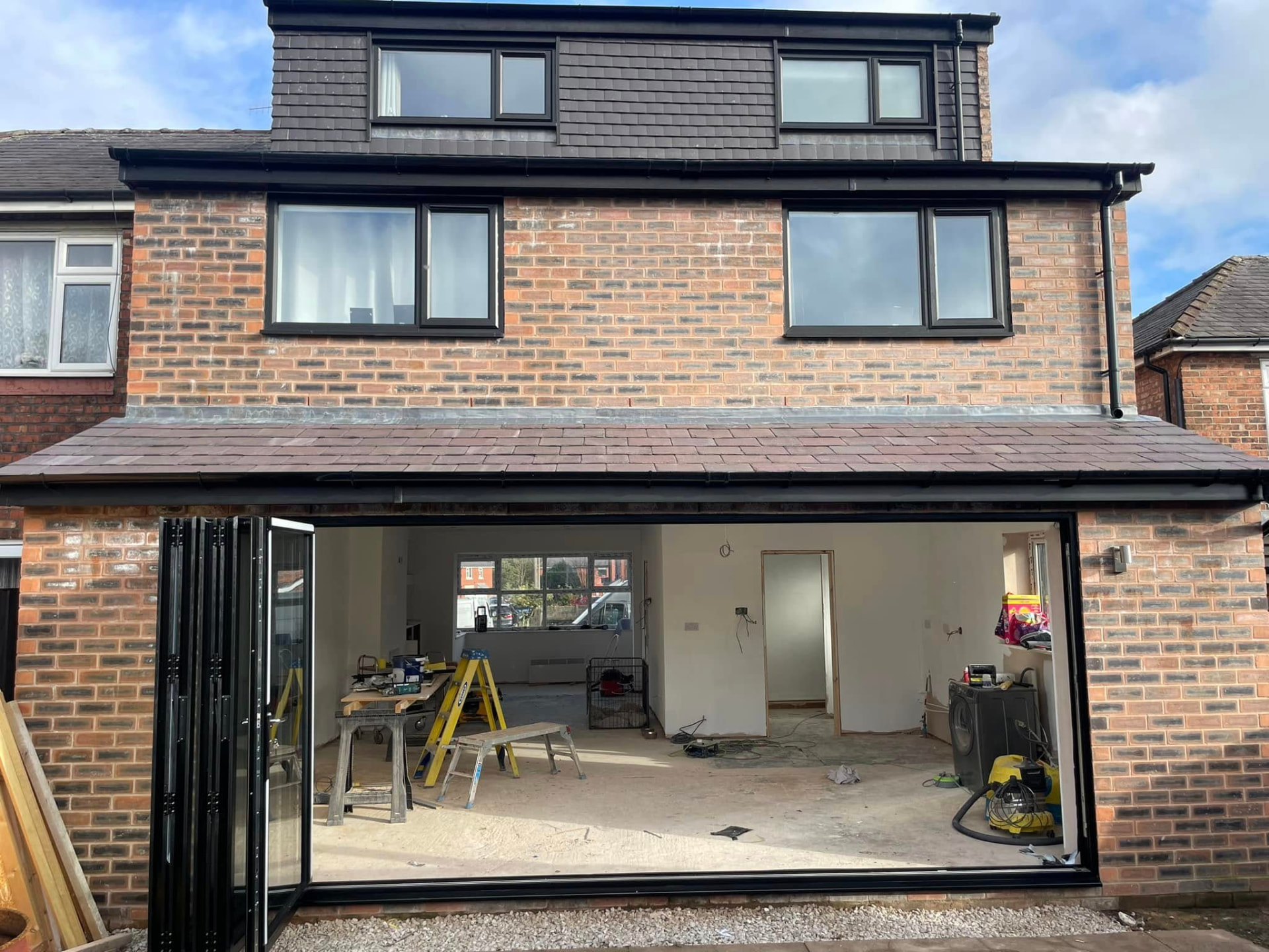 Five-panel black bifolds, Rear extension